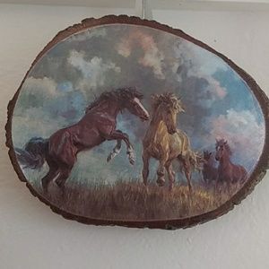 Wild horse art on slice of wood